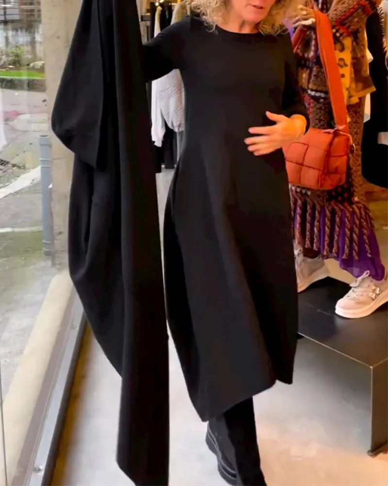 Gerrie | Black midi dress with pockets