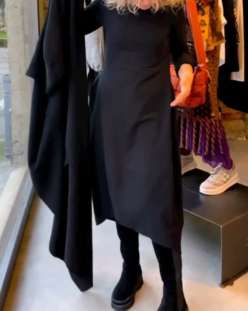 Gerrie | Black midi dress with pockets