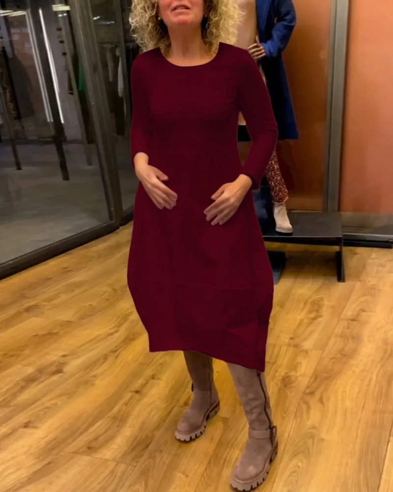 Gerrie | Black midi dress with pockets