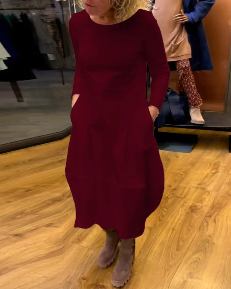 Gerrie | Black midi dress with pockets