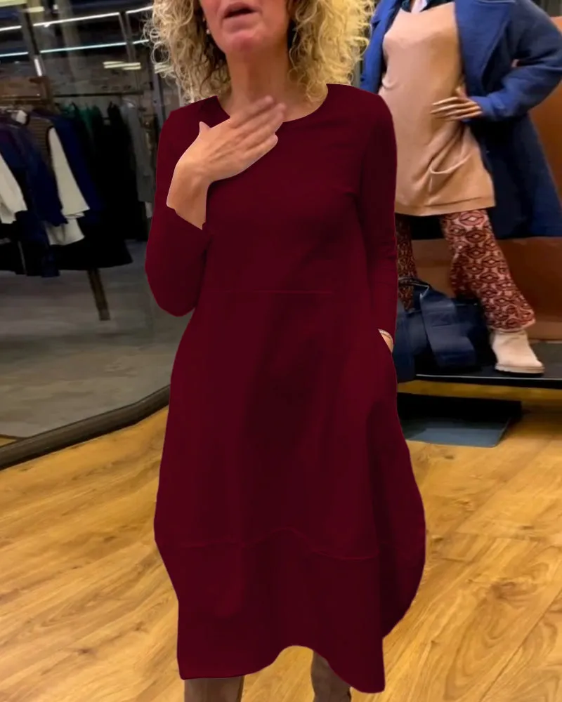 Gerrie | Black midi dress with pockets