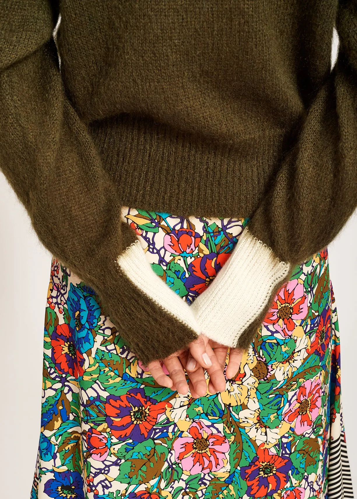 Khaki green light knit sweater with contrasting cuffs
