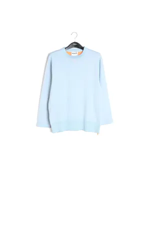 Light blue sweater with boxy cut