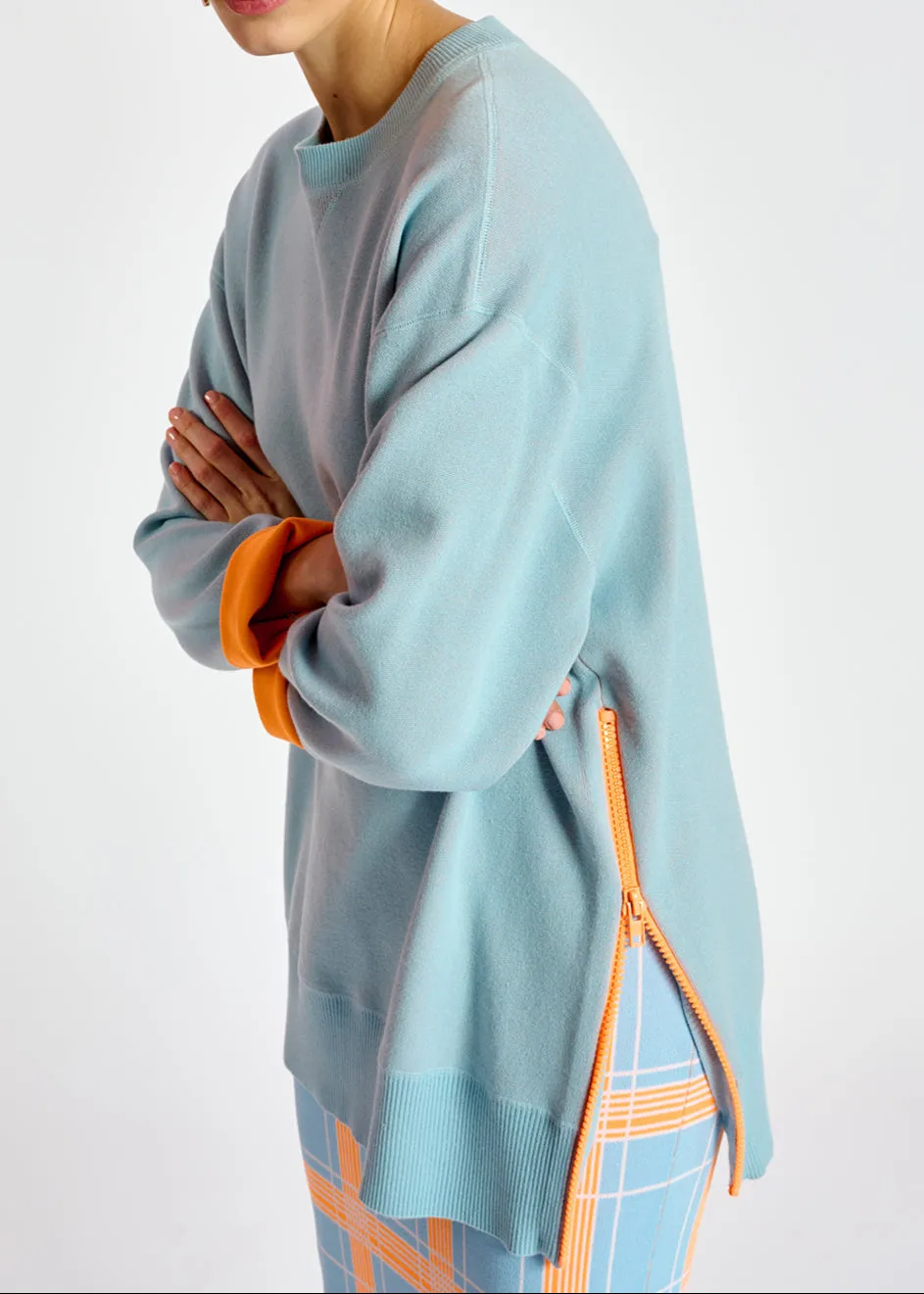 Light blue sweater with boxy cut