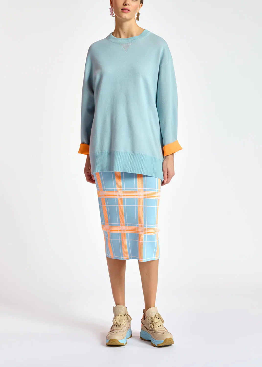 Light blue sweater with boxy cut