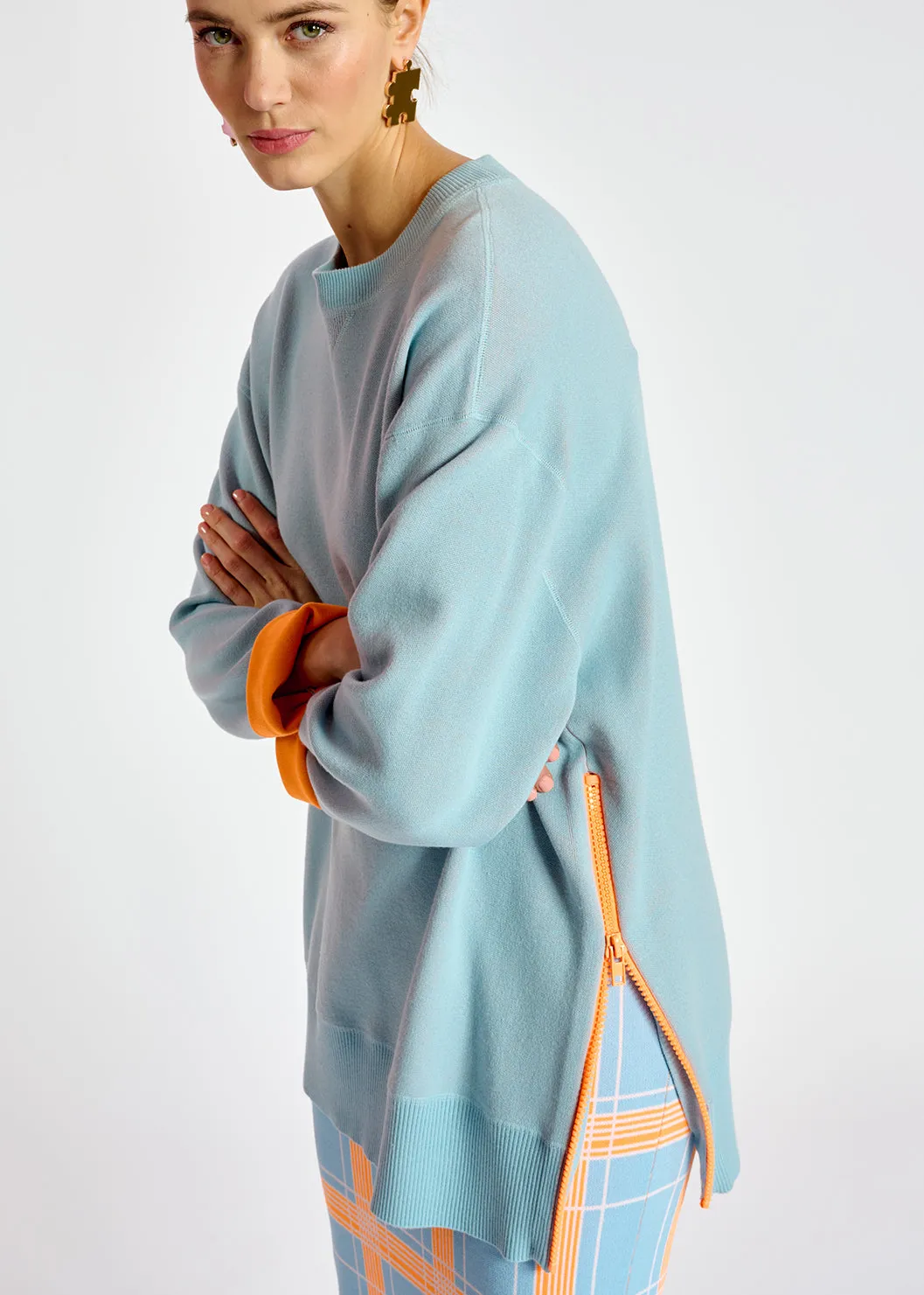 Light blue sweater with boxy cut