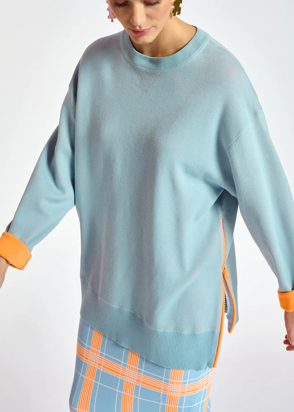 Light blue sweater with boxy cut