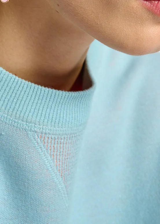 Light blue sweater with boxy cut